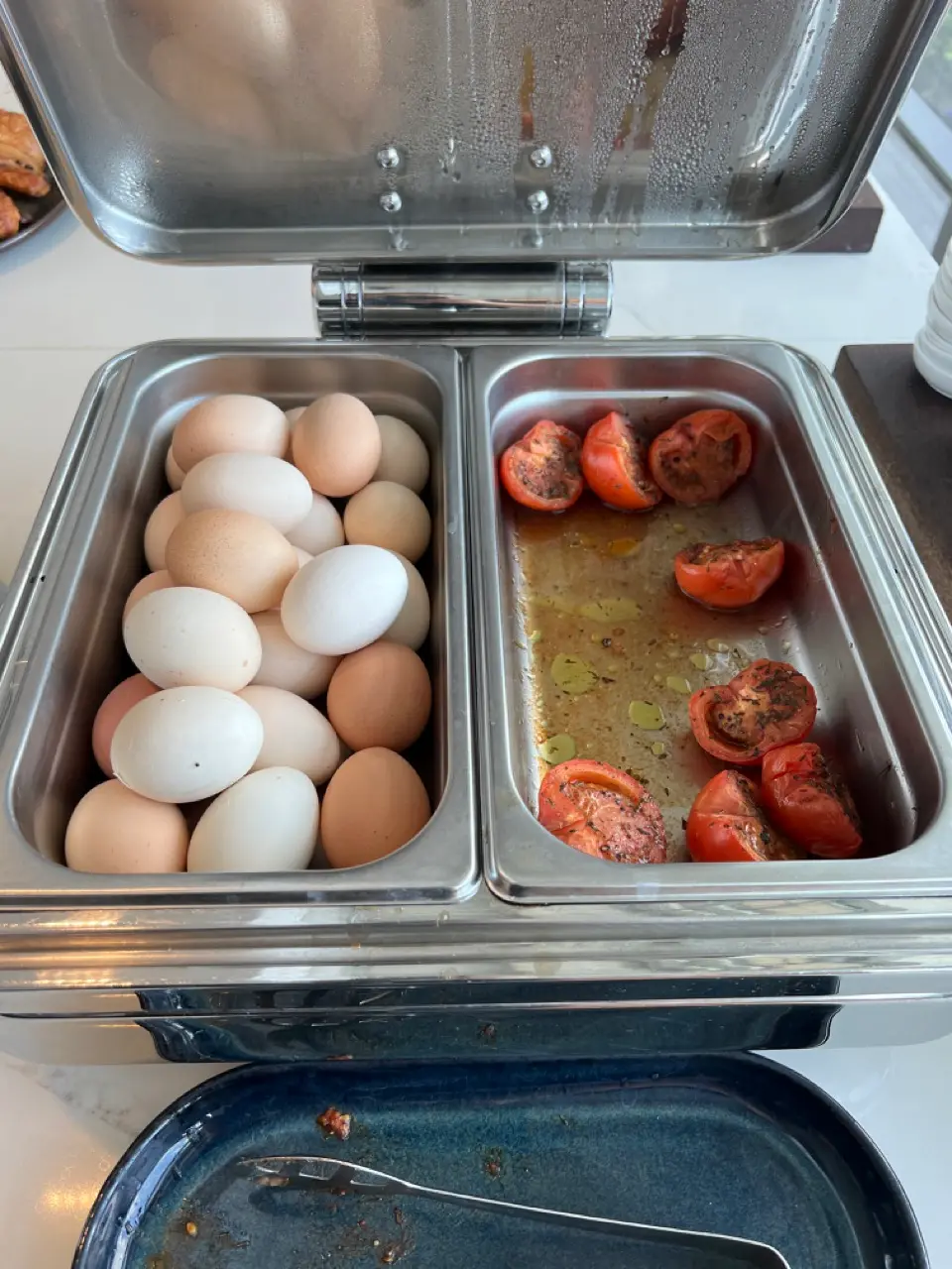 Qantas lounge eggs and grilled tomato